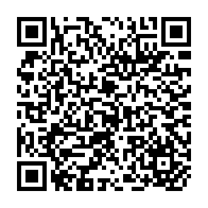 QR Code for Library services for the woman in the middle